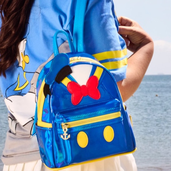 Loungefly Handbags - NWT Loungefly Disney Metallic Donald Duck 90th anniversary backpack